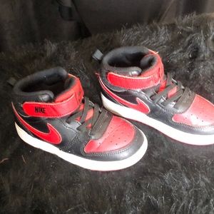 Red and black Nikes